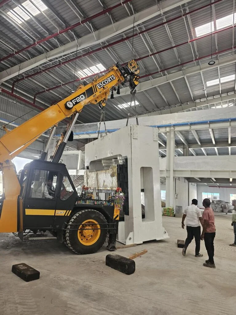 Industrial machinery base alignment and level verification on factory floor